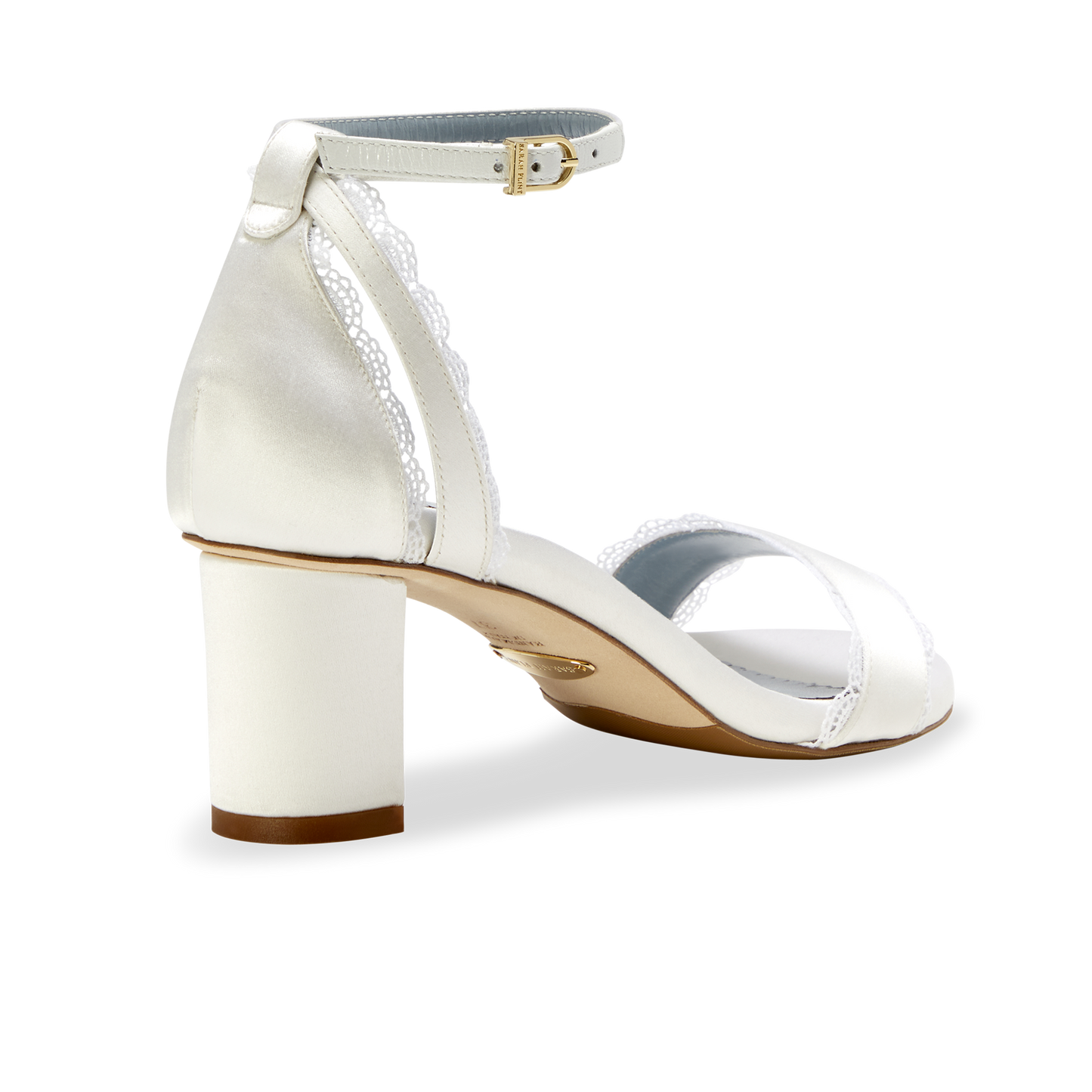 Stylish and comfortable, the Perfect Block Sandal 60 in Wedding White Satin features a 60mm block heel, arch support, and adjustable ankle straps.